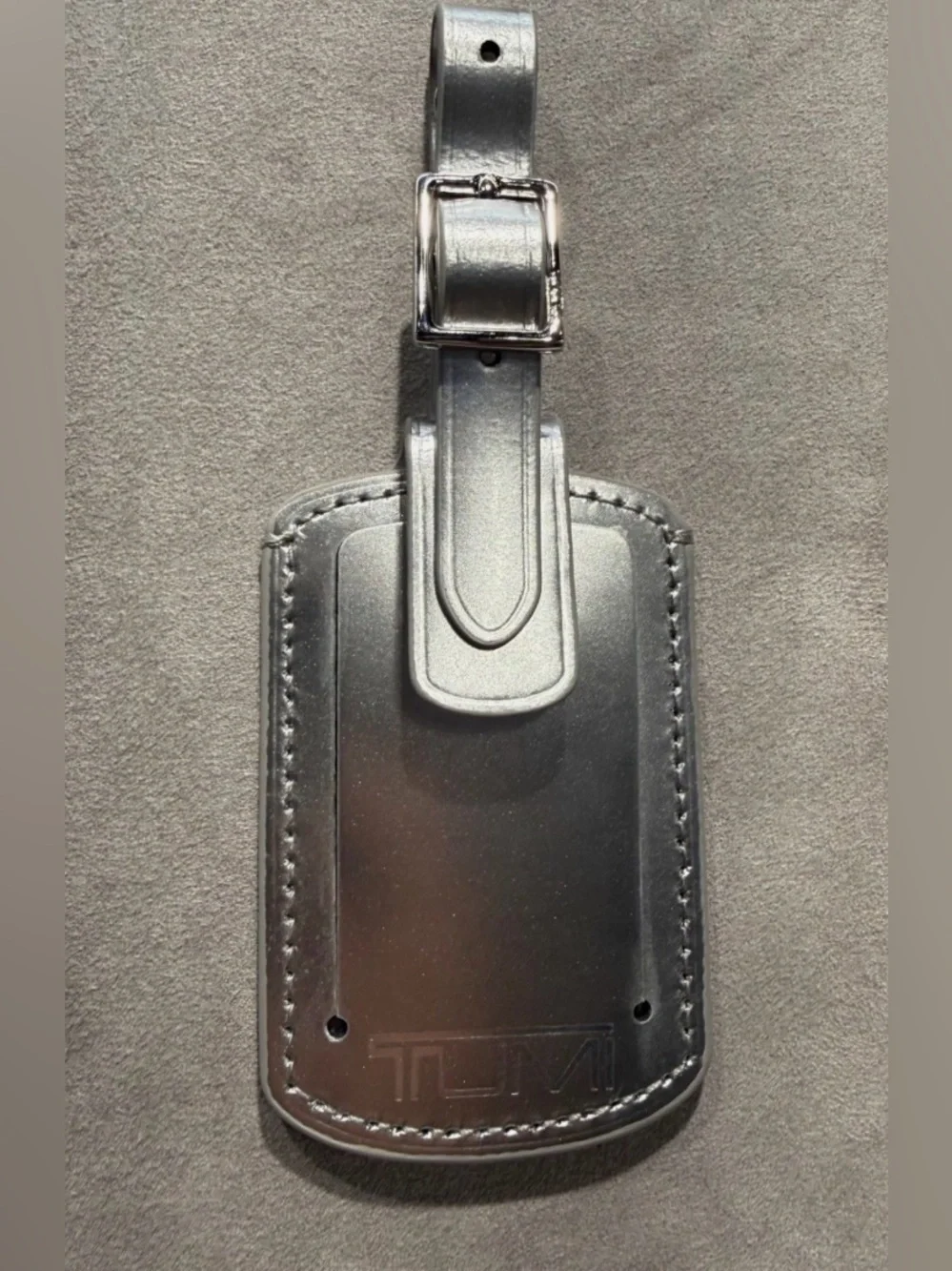 NEW Tumi 3.625” x 2.25” Leather Luggage Name Tag w/ Buckle - METALLIC SILVER